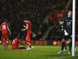Saints players look dejected following an own goal by Guly Do Prado in the match against Arsenal on January 1, 2013