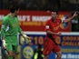 Liverpool's Jamie Carragher barks orders at Brad Jones during a game with Mansfield on January 6, 2013