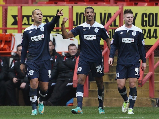 Huddersfield striker Jermaine Beckford celebrates his goal against Charlton on January 5, 2013