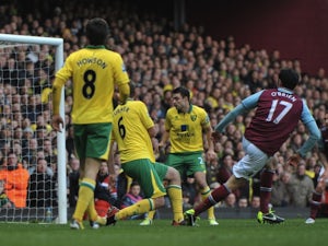 Hammers defender Joey O'Brien slots home their second goal against Norwich on January 1, 2013