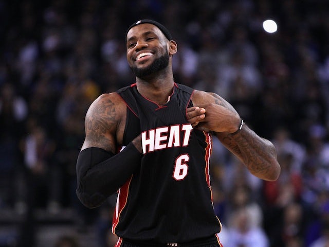 Miami Heat forward LeBron James smiles during their game against the Golden State Warriors at Oracle Arena on January 10, 2012
