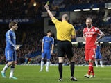 Chelsea's Marko Marin is booked for a reckless tackle against QPR on January 2, 2013