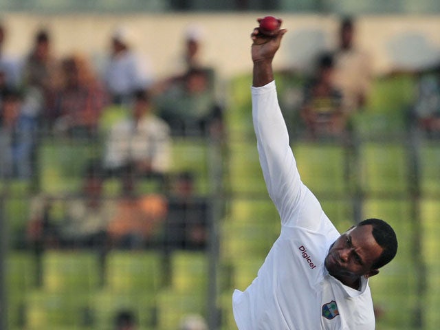 Marlon Samuels bowling for the West Indies on November 15, 2012