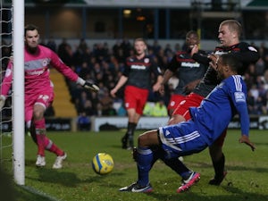 Macclesfield striker Matthew Barnes-Homer scores the equaliser against Championship leaders Cardiff on January 5, 2013