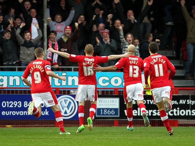 Crawley's Nicky Adams celebrates his goal just 14 seconds into the game with Reading on January 5, 2013