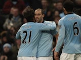 City defender Pablo Zabaleta is congratulated on his goal against Stoke on January 1, 2013