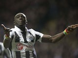 Magpies striker Papiss Cisse celebrates his early goal in the game with Everton on January 2, 2013