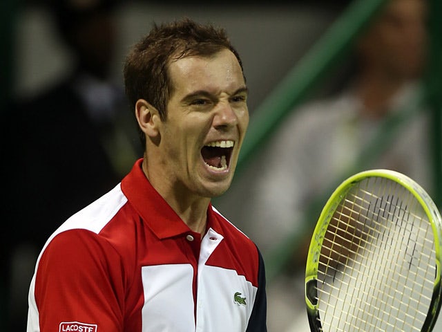 Richard Gasquet celebrates his win over Daniel Brands in the Qatar Open on January 4, 2013