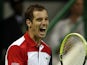 Richard Gasquet celebrates his win over Daniel Brands in the Qatar Open on January 4, 2013