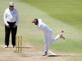 South Africa's Robin Peterson bowls during their test match against India on December 30, 2013
