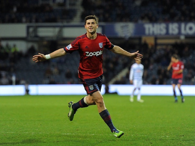 West Brom striker Shane Long celebrates opening the scoring at QPR on January 5, 2013