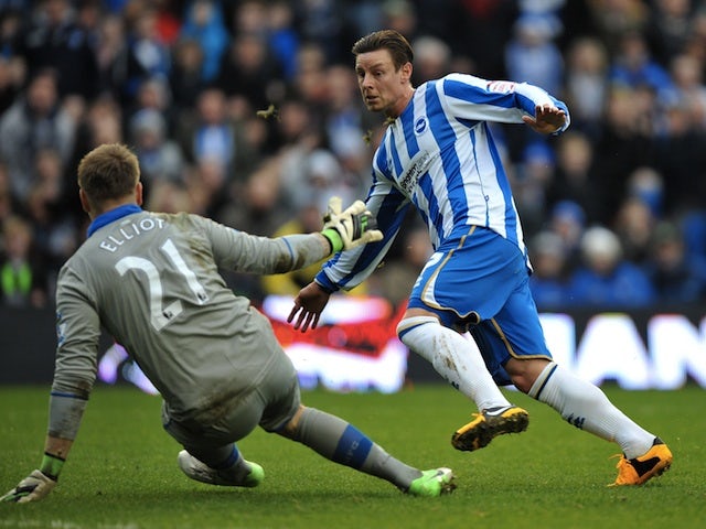 Brighton's Will Hoskins slots the second goal home against Newcastle on January 5, 2013