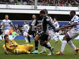 Spurs' Aaron Lennon is thwarted by QPR keeper Julio Cesar on January 12, 2013
