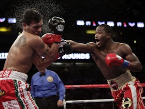 Adrien Broner lands a punch on Daniel Ponce De Leon during their fight on 5 March, 2011