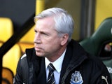 Magpies manager Alan Pardew sits in the dugout during the game with Norwich on January 12, 2013