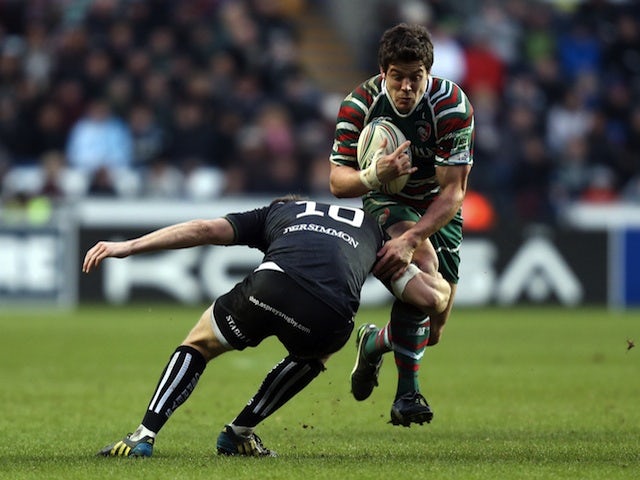 Leicester's Anthony Allen is tackled by Ospreys' Dan Biggar during the match on January 13, 2013