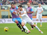 Mattia Destro of AS Roma challenges for the ball in his sides Serie A clash with Catania on January 13, 2013