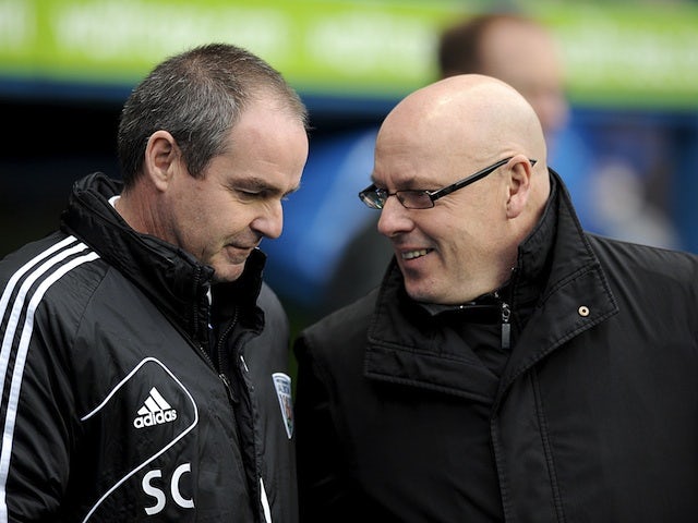 Bosses Brian McDermott and Steve Clarke chat prior to the kick-off of Reading v West Brom on January 12, 2013
