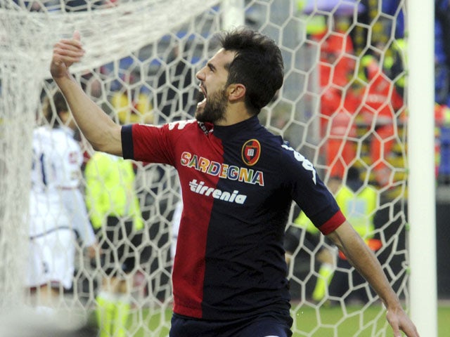 Cagliari forward Marco Sau celebrates scoring his sides first goal against Genoa in their Serie A clash on January 13, 2013 