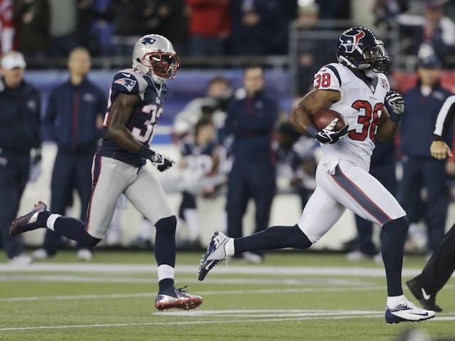 Texans' Danieal Manning returns the game's first kick-off for 94 yards against New England on January 13, 2013