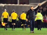 Barnsley caretaker manager David Flitcroft celebrates watching his side beat Leeds United on 12 January, 2013