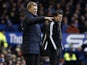 Opposing managers David Moyes and Michael Laudrup on the touchline during the game between Everton and Swansea on January 12, 2013