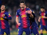 Barcelona's David Villa is congratulated by team mates after scoring against Cordoba on January 10, 2013