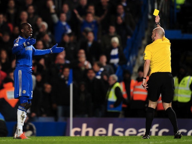 Chelsea forward Demba Ba is booked for diving against Swansea on January 9, 2013