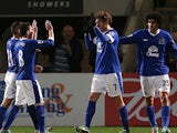 Nikica Jelavic celebrates with team mates after scoring the opener against Cheltenham in the FA Cup on January 7, 2013
