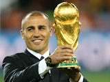 Fabio Cannavaro of Italy presents the World Cup trophy prior to Netherlands v Spain final 11 July, 2010