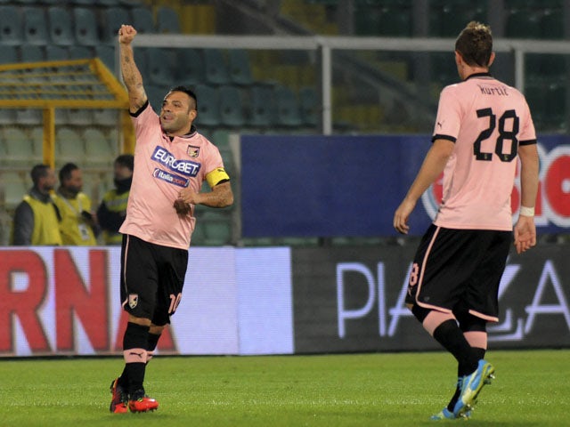 Fabrizio Miccoli celebrates scoring for Palermo during their Seria A match against Catania on 24 November, 2012