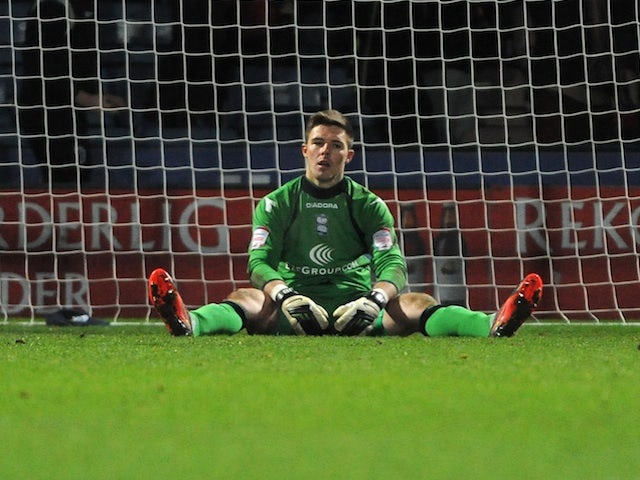 Birmingham goalie Jack Butland sits dejected after a late Huddersfield equaliser on January 12, 2013