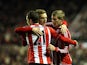 James McClean celebrates with team mates after scoring his team's third goal on January 12, 2013