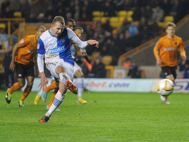 Half-Time Report: Rhodes penalty puts Blackburn ahead