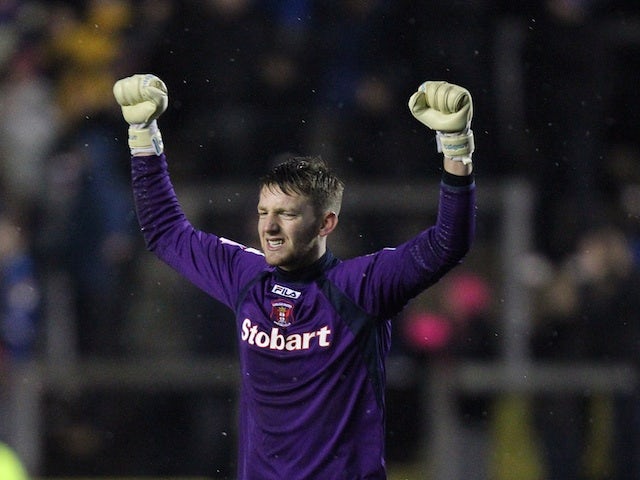 Carlisle keeper Mark Gillespie celebrates victory over Coventry on January 13, 2013