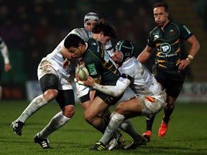 Northampton's George Pisi is tackled during his teams Heineken Cup match on 11 January, 2013