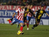 Atletico striker Radamel Falcao scores a goal against Zaragoza on January 13, 2013