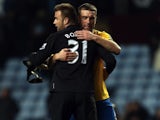 Saints forward Rickie Lambert celebrates the win over Aston Villa with goalkeeper Artur Boruc on January 12, 2013