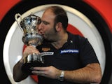 Scott Waites with the trophy, following his win in the BDO World Darts Championship on January 13, 2013