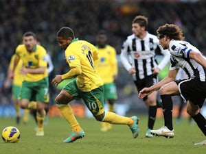 Newcastle hold off Norwich charge