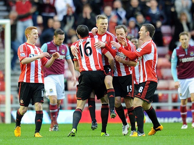 Sebastian Larsson is congratulated by team mates after scoring the opener against West Ham on January 12, 2013
