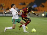 Morocco's Abderrahim Achchakir challenges Geraldo Bartolomeu of Angola during their African Nations Cup match on January 19, 2013