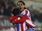 Athletico's Adrian Lopez is congratulated by Radamel Falcao after a goal against Levante on January 20, 2013