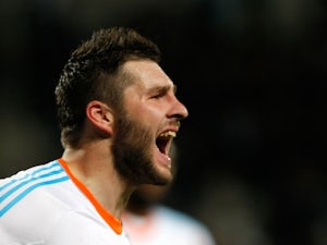 Marseille striker Andre-Pierre Gignac celebrates a goal against Montpellier on January 19, 2013