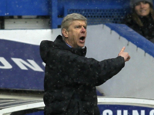 Arsenal boss Arsene Wenger on the touchline at Stamford Bridge on January 20, 2013