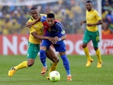 Cape Verde's Babanco Macedo tussles with South Africa's Kagisho Dikgacoi in the African Nations Cup match on January 19, 2013