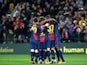 Barcelona players celebrate their second goal against Malaga in the Copa del Rey on January 16, 2013