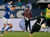 Schalke's Ciprian Marica scores his team's fourth goal against Hannover on January 18, 2013