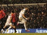 Spurs' Clint Dempsey celebrates his late equaliser against Man Utd on January 20, 2013