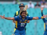 Sri Lanka's Lasith Malinga celebrates taking the wicket of Australia's Mitchell Johnson on January 20, 2013